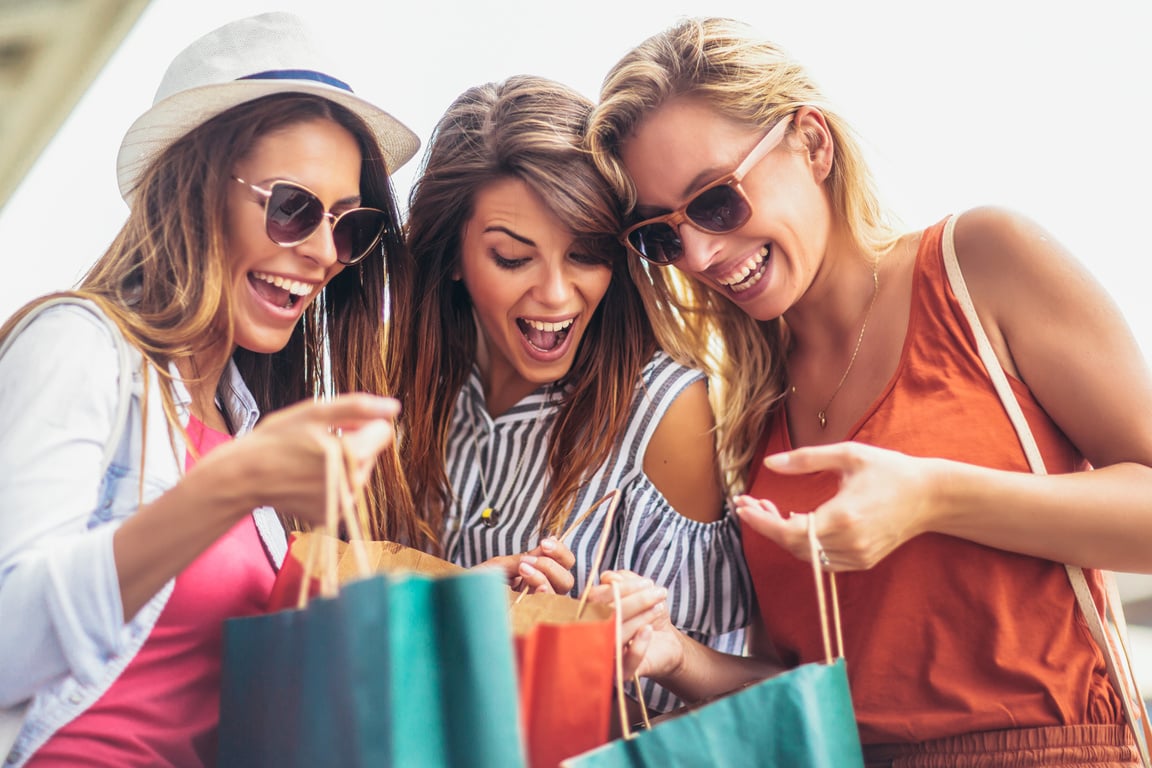 Three women shopping together.